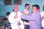 Mr. Hiralal Shinde, treasurer felicitating Mr. Bhandare, the member, present Mr. Pandurang Khandare, Director