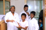 Mr. Ashok Sonawane, General Manager, distributing the free notebooks to the students, behind Mr. Machindra Shinde, Director. 

