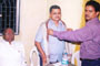 Mr. Maloji Honkalas, Then Chairman, felicitating Mr. Kondvilkar. Mr. Eknath Gaikwad, MP sitting.



